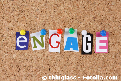 The word Engage in cut out magazine letters